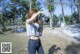 A woman taking a picture of herself with a camera.